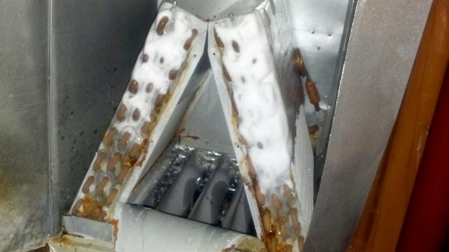 frozen A/C coils inside an air conditioner
